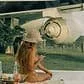 A young woman relaxing by the pool at Villo Studio, a stylish boutique in South Africa.