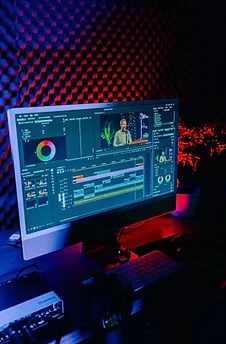 Production monitor in an acoustically treated recording room