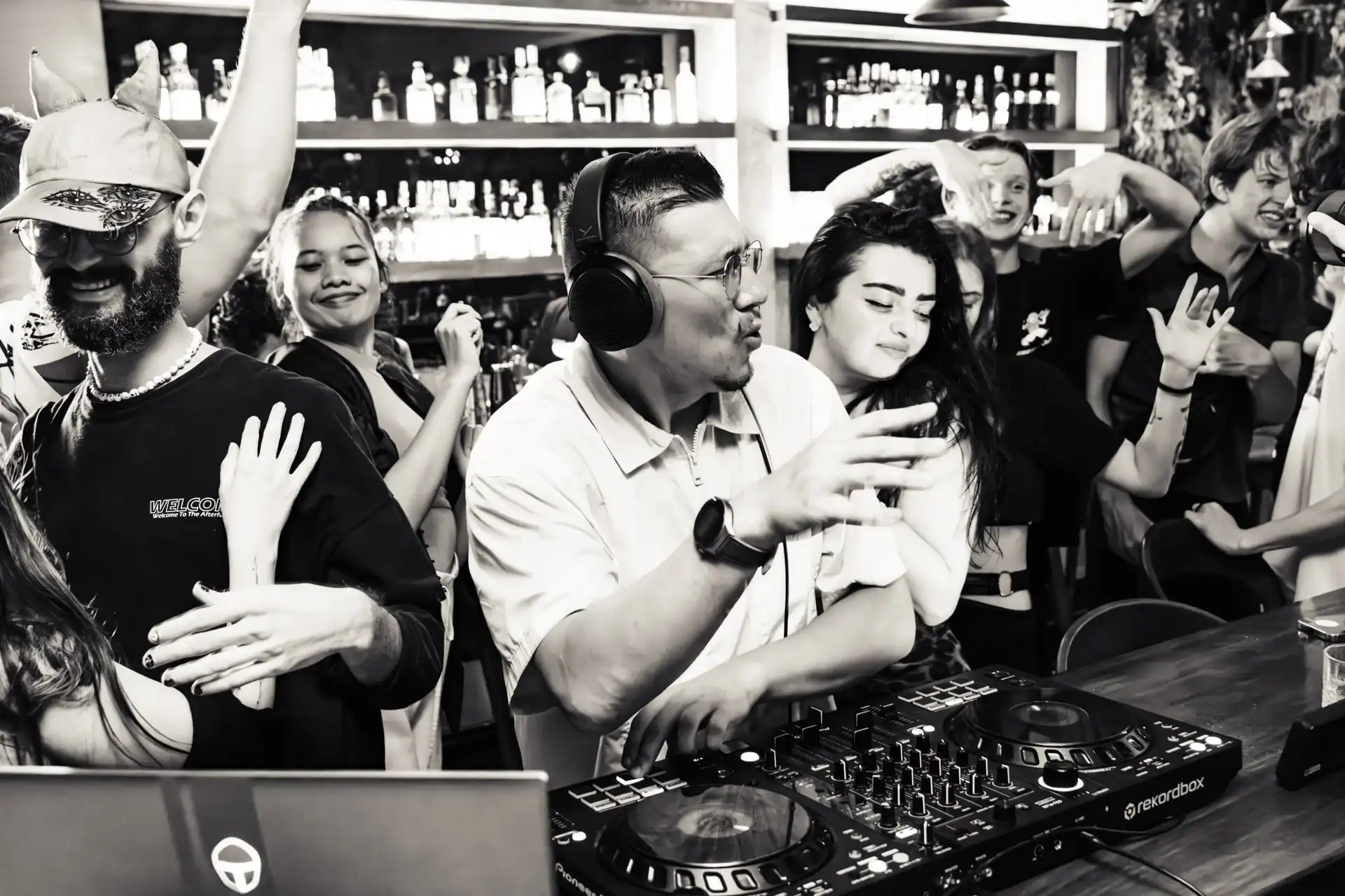 Villo Studio DJ event with diverse guests enjoying music and dancing at a trendy venue in South Africa.