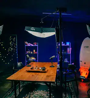 Modern podcast recording studio with professional equipment and vibrant lighting in South Africa.