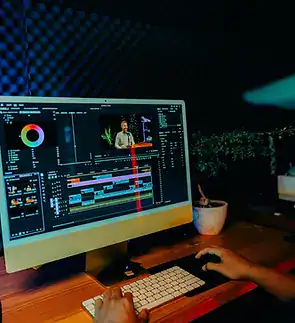 Professional video editing on a computer with advanced software for creative projects.